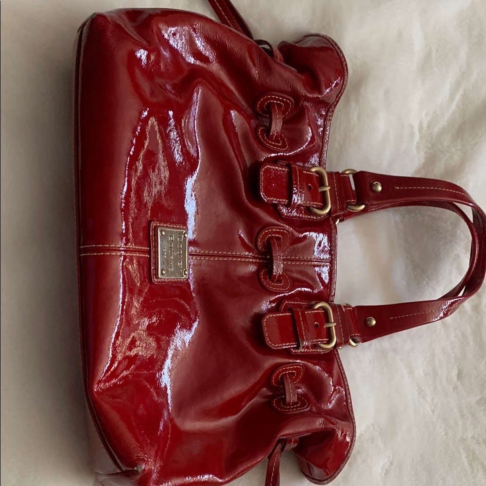Women’s red leather Dooney and Bourke purse